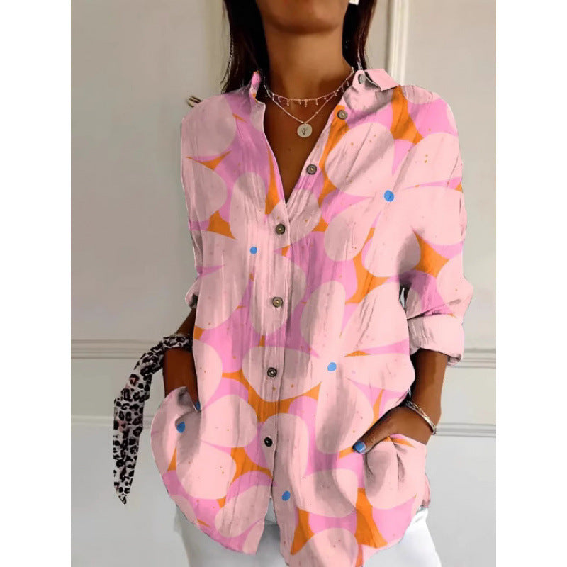 Coralina - Long-sleeved blouse with vibrant blue print