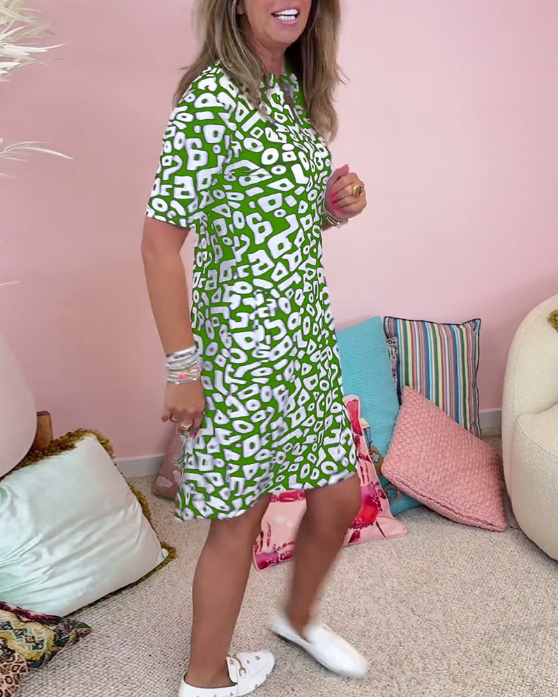 Viaro | Printed dress with V-neck and pockets