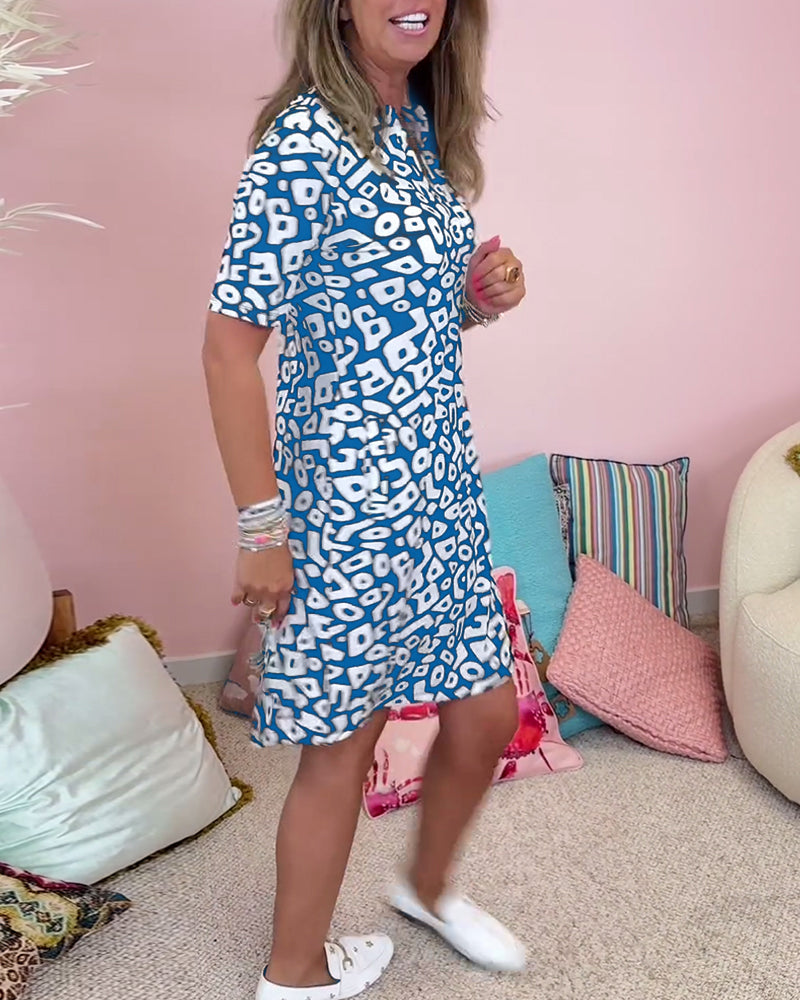 Viaro | Printed dress with V-neck and pockets