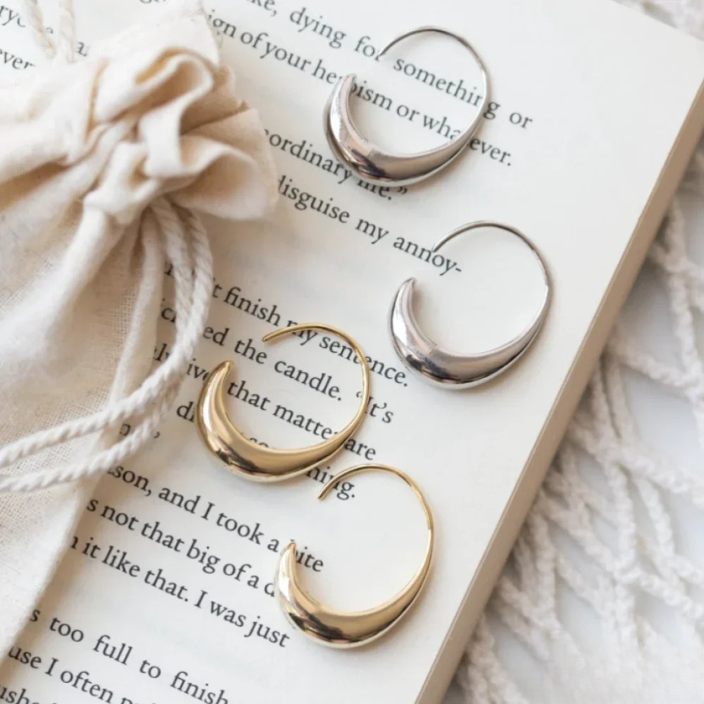 Elegant Earrings Made of Gold and Silver