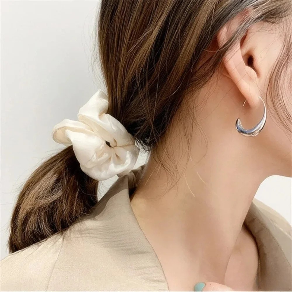 Elegant Earrings Made of Gold and Silver