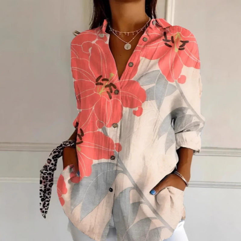 Coralina - Long-sleeved blouse with vibrant blue print